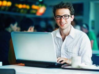 Young man in front of laptop